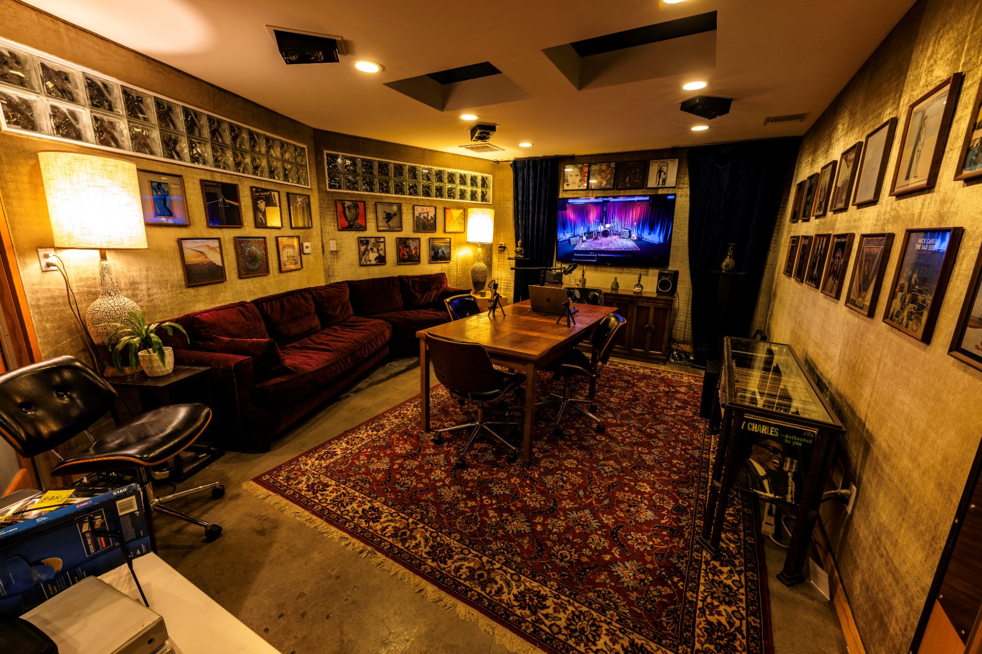 Studio G lounge with velvet couch and album art walls — Clearmountain's Berkeley Street Studios